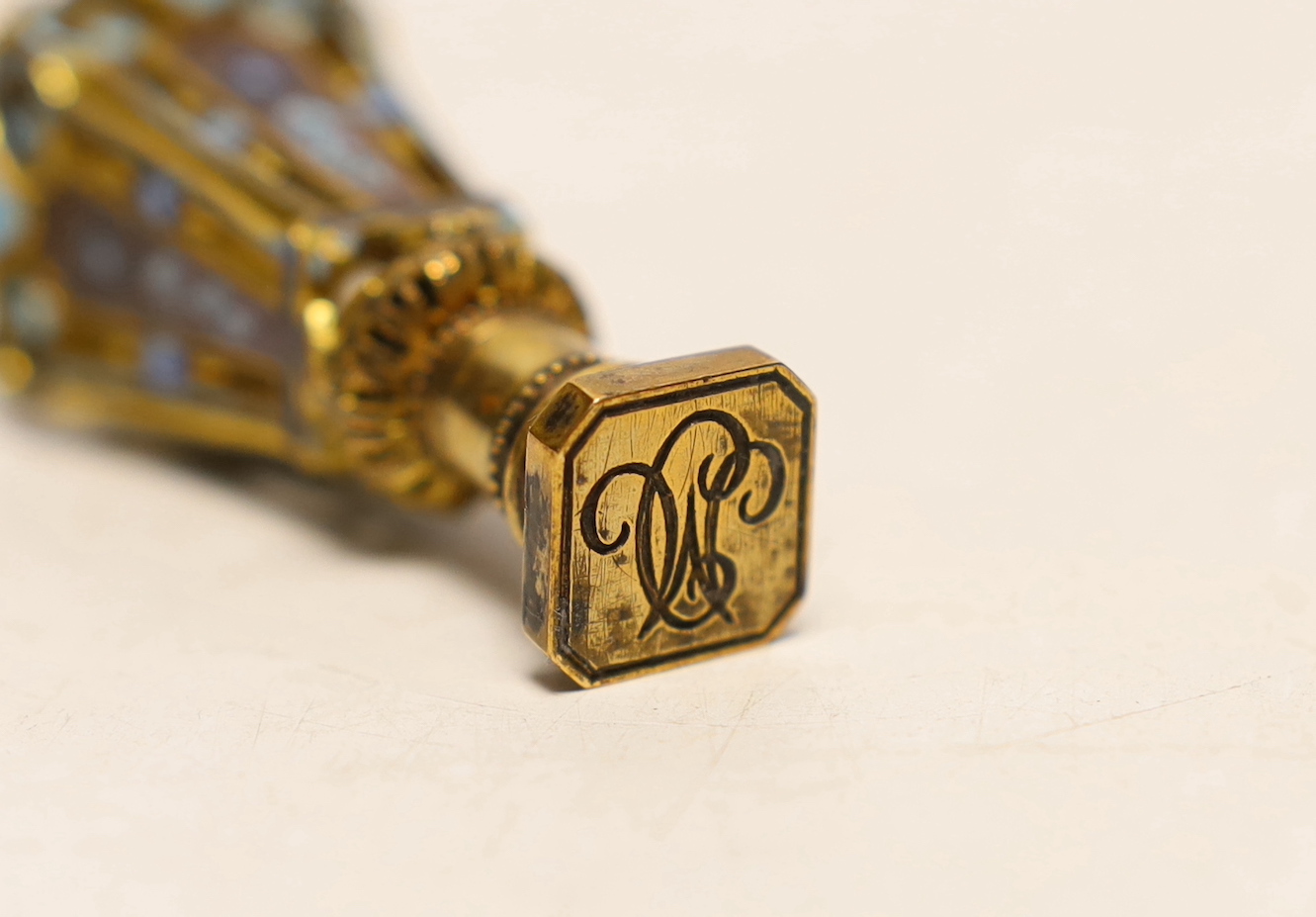 A late 19th century French cased gilt metal and champleve enamel desk seal, 5.5cm high